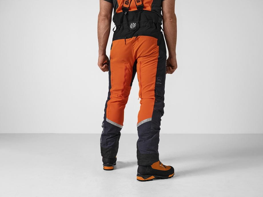Technical Robust trousers - male model, back (Studio background)