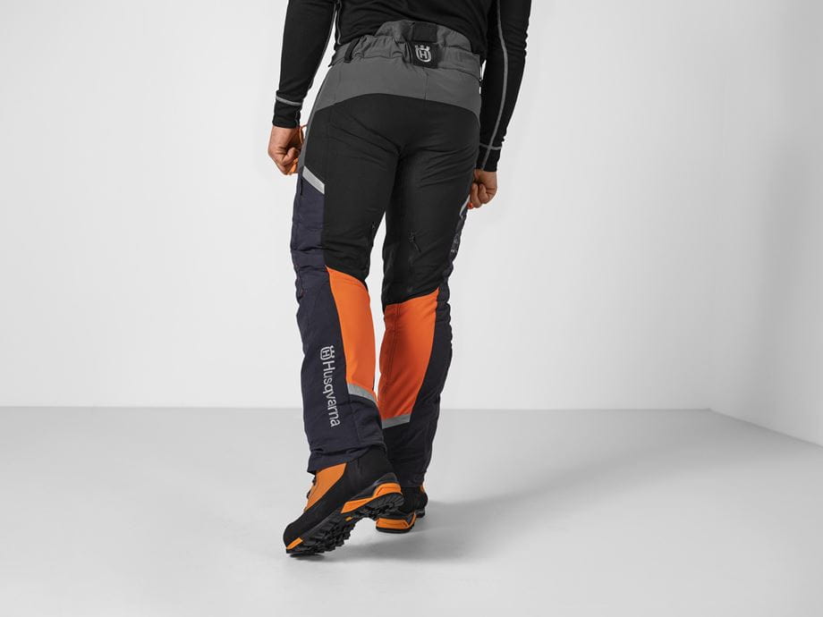 Technical Extreme Arborist trousers - male model, back (studio background)