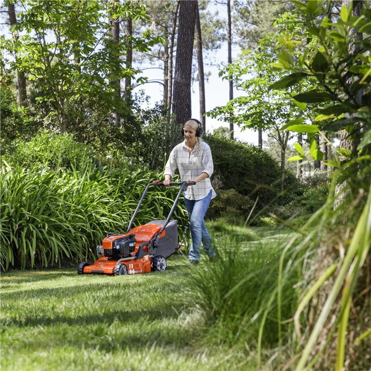 Walk-behind LC 347VI / Woman mowing grass