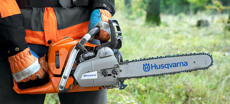 Husqvarna chainsaw with PPE